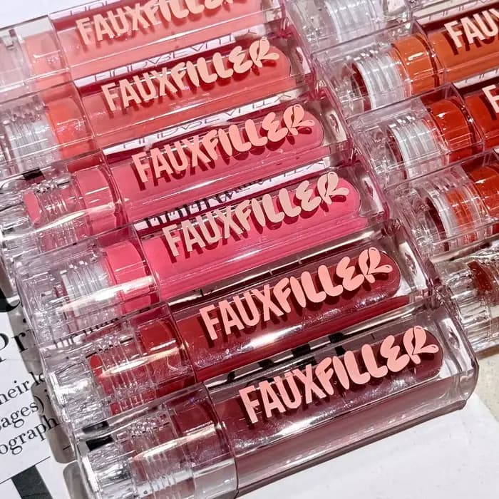 Huda Beauty Faux remplissage brillant Non collant