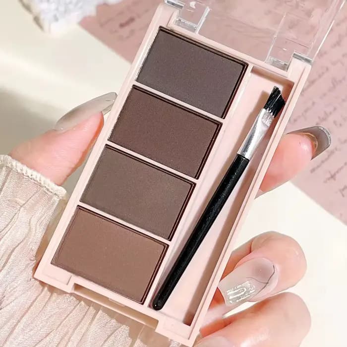Un ensemble de plateaux de poudre à sourcils de 4 couleurs avec des pinceaux en tons gris et marron mat pour un rendu durable, un remplissage et un s