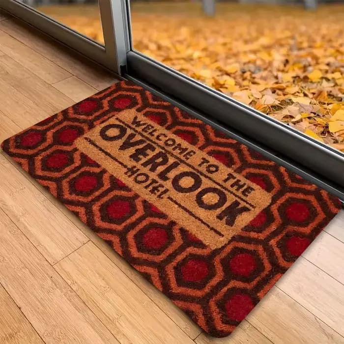Paillasson sur le thème de l'hôtel vintage – Matériau épais en flanelle, hexagone rouge orange avec texte de bienvenue noir audacieux, décoration intérieure et extérieure