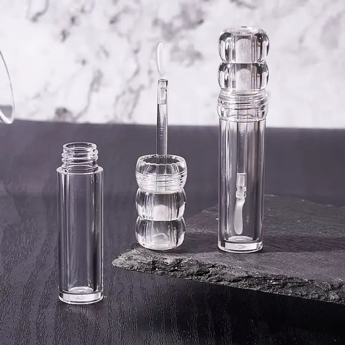 Tube de brillant à lèvres cosmétique rond