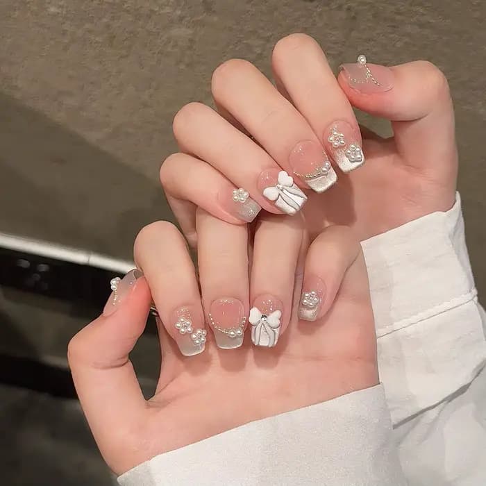 Presse à la main sur les ongles doux nœud papillon perle décor français faux ongles pour femmes fill