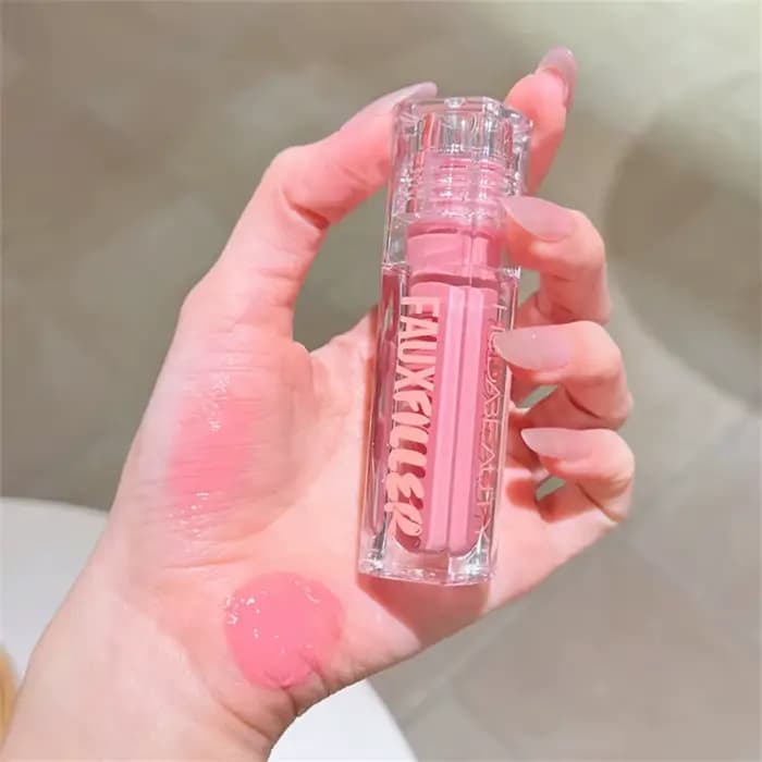 Huda Beauty Faux remplissage brillant Non collant
