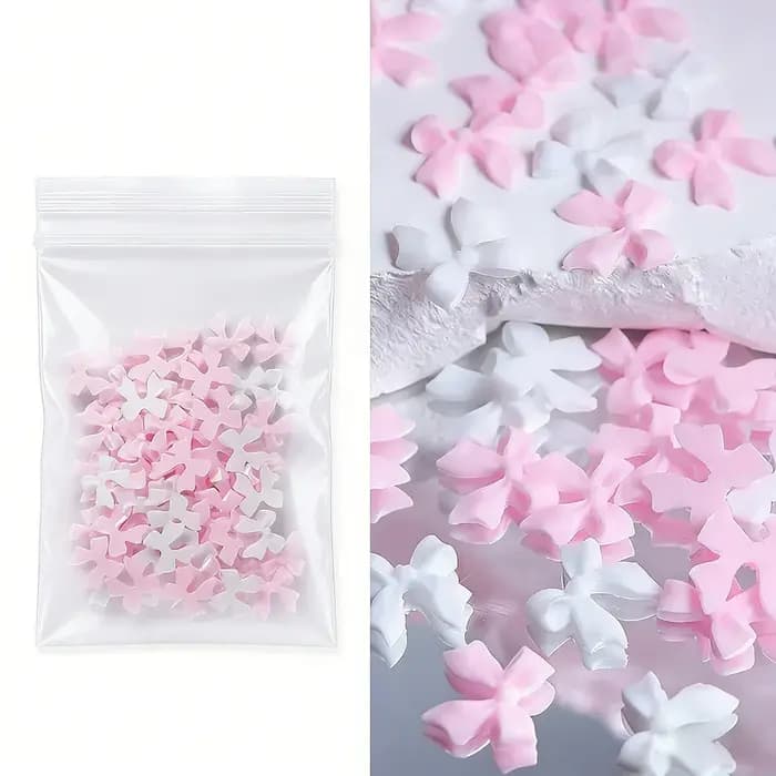 Breloques pour ongles avec nœud en ruban rose et blanc