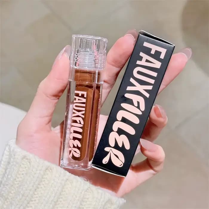 Huda Beauty Faux remplissage brillant Non collant