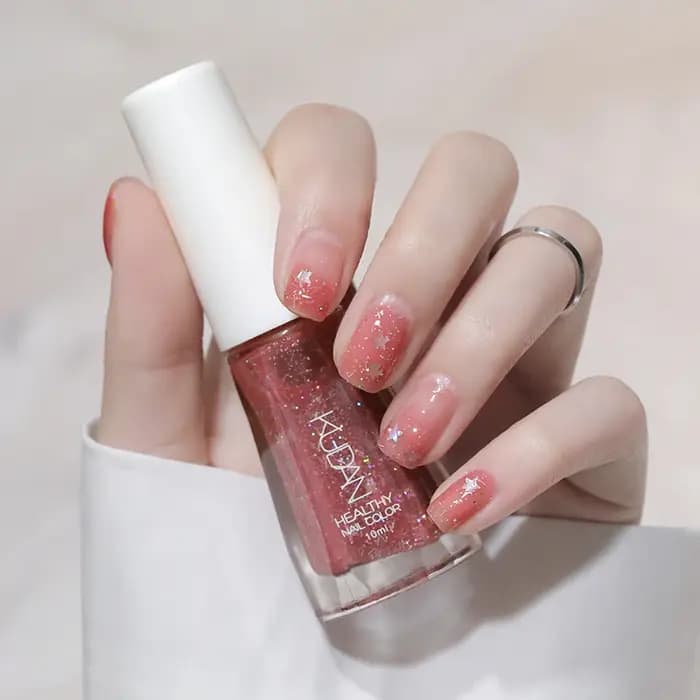 Vernis à ongles gel pailleté rose et rouge tendance