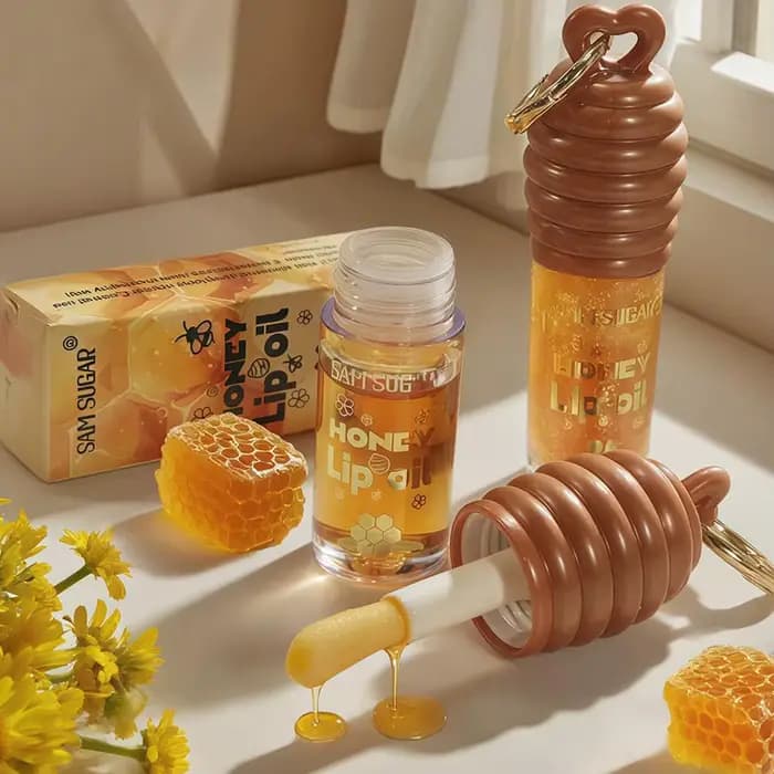 Huile pour les lèvres à l'essence de miel